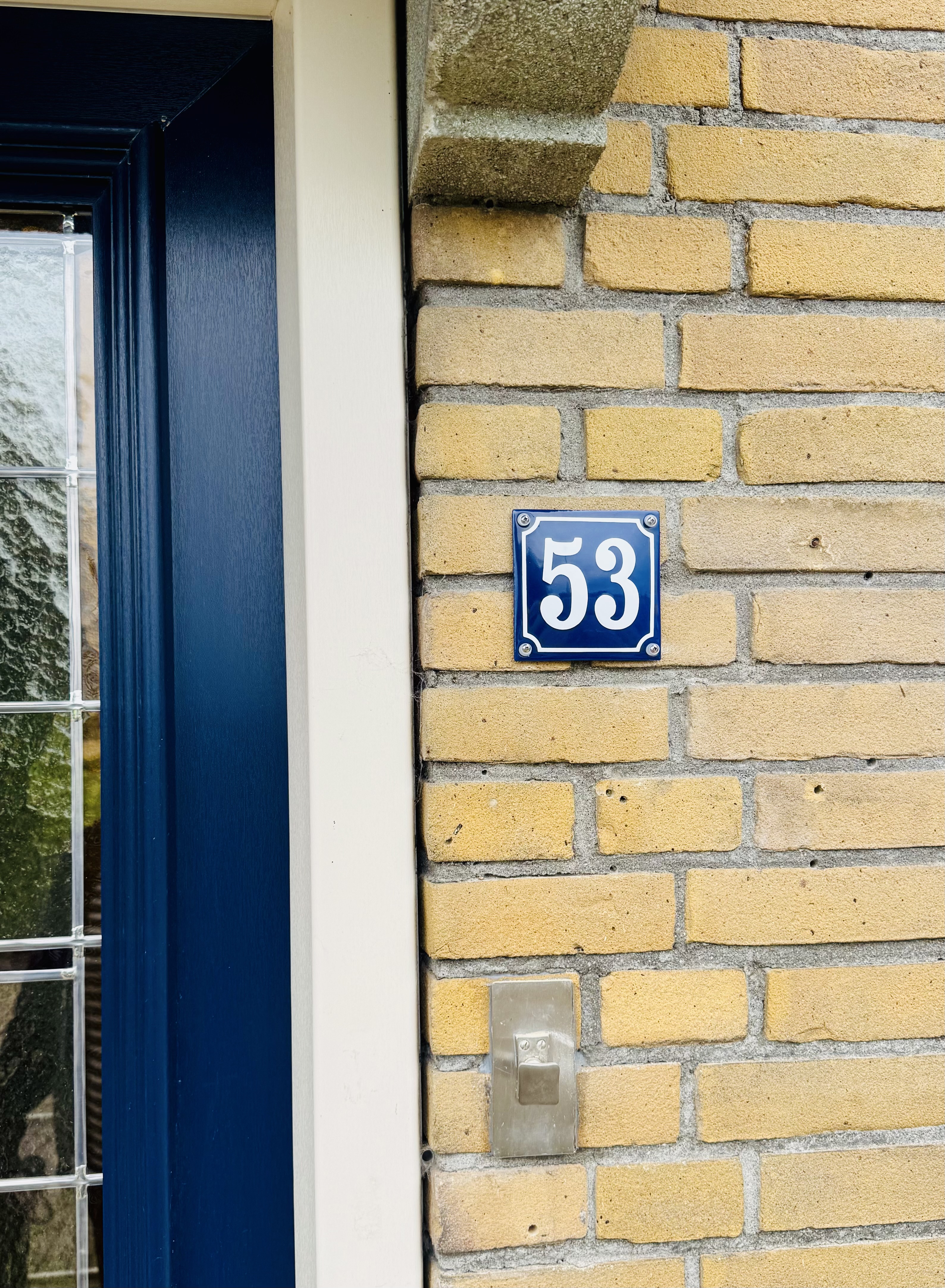 Numéro bombée avec cadre bleu/blanc