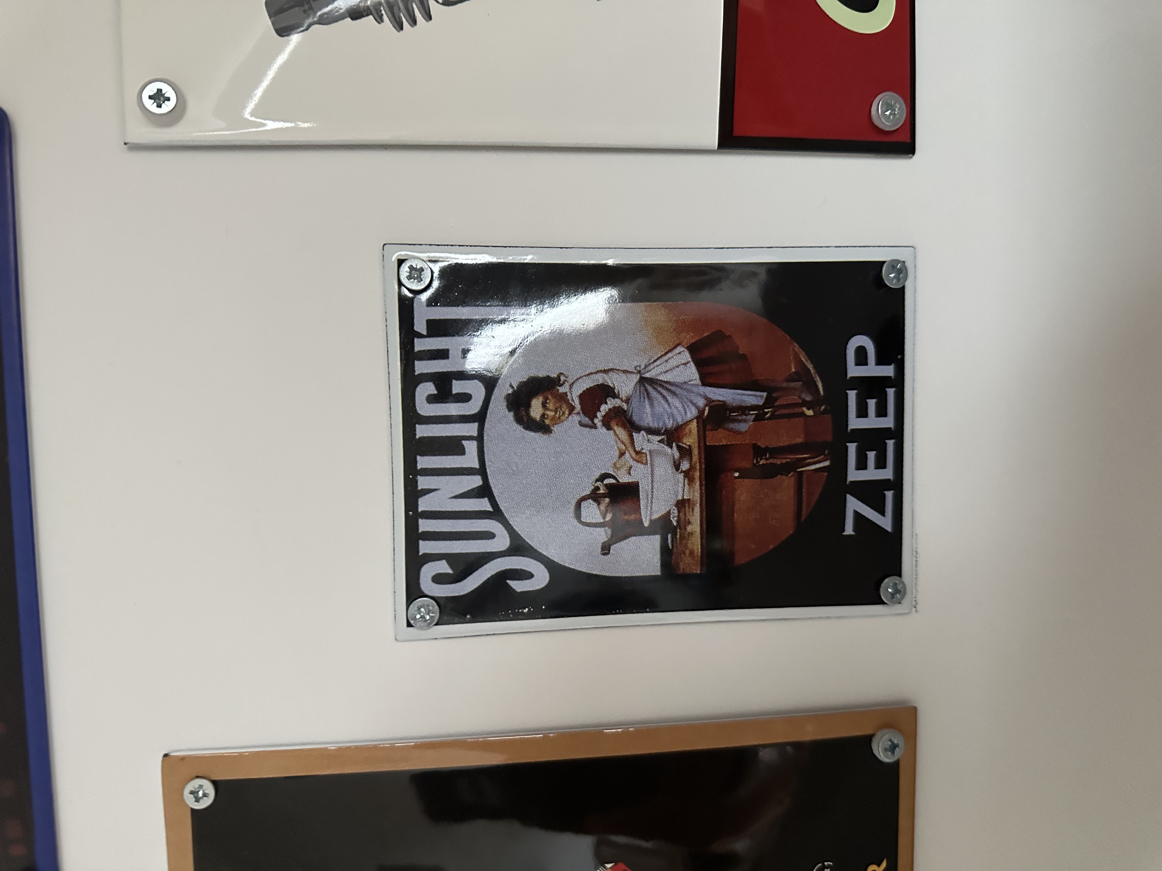 Sunlight plaque émaillé